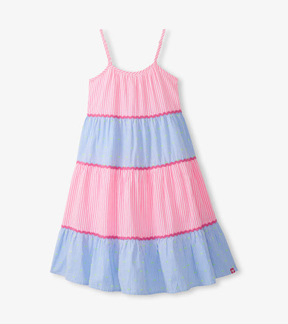 Girls tiered strappy midi dress with pink and blue striped panels, green dots, and pink scalloped trim