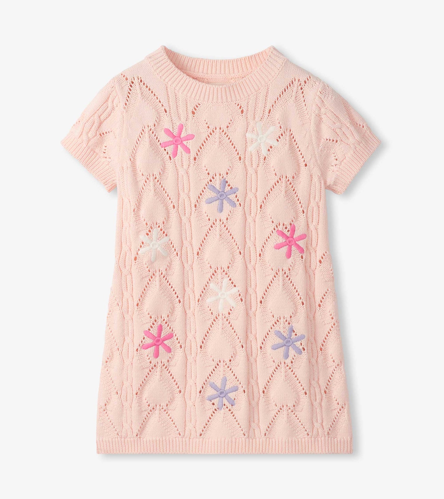 Light pink short-sleeve crochet knit dress with floral cutout pattern and colorful flower appliqués, front view