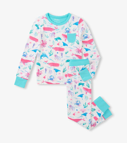Girls white bamboo pajama set with colorful sea life print and turquoise trim, long sleeves and pants