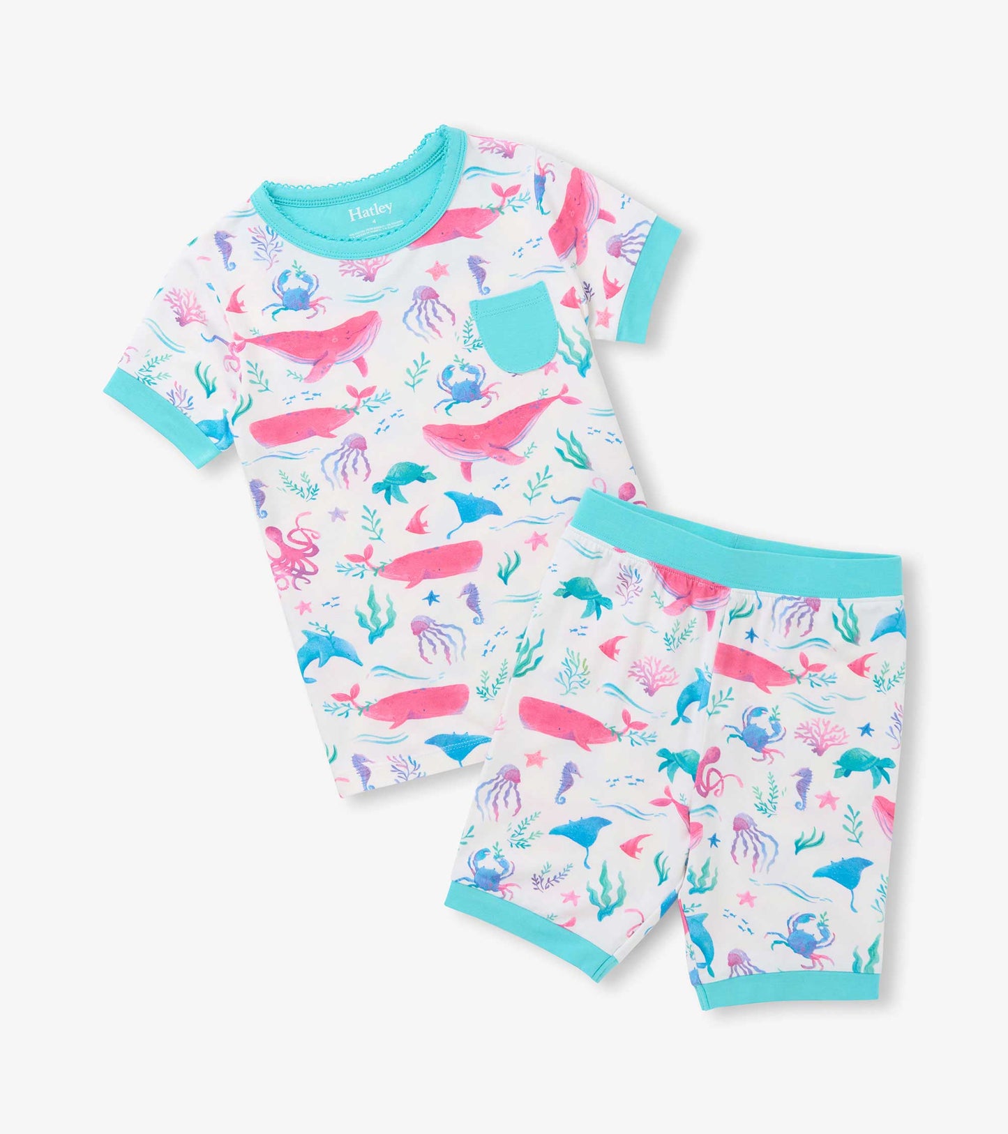 Two-piece white short pajama set with pastel whales, crabs, turtles and aqua trim
