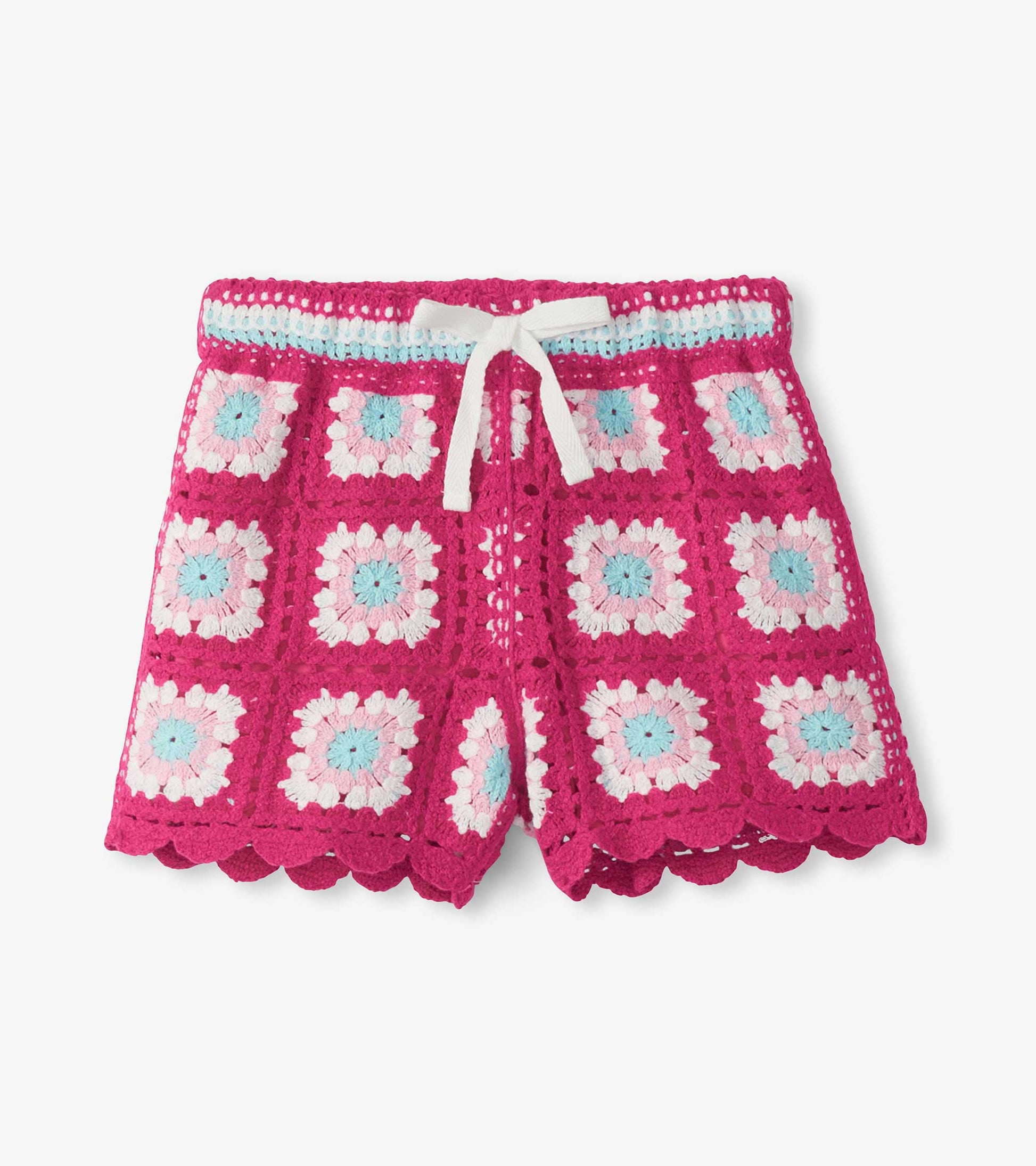 Girls pink crochet shorts with floral square pattern, white drawstring, and scalloped hem, front view