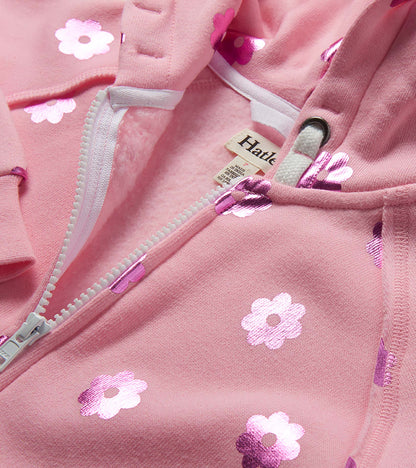 Pink girls zip-up hoodie with metallic flower print and white zipper, close-up front view