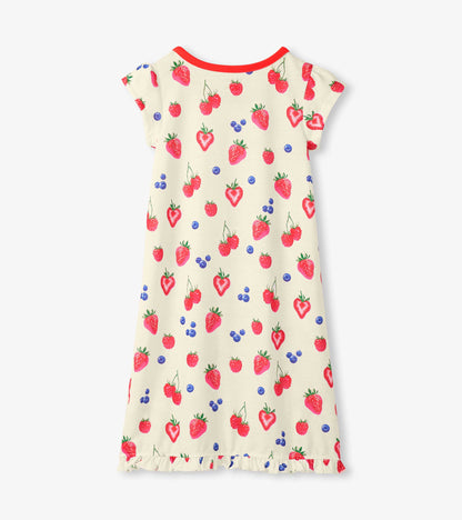 Girls cream nightdress with strawberry and blueberry print, red trim, and ruffle hem