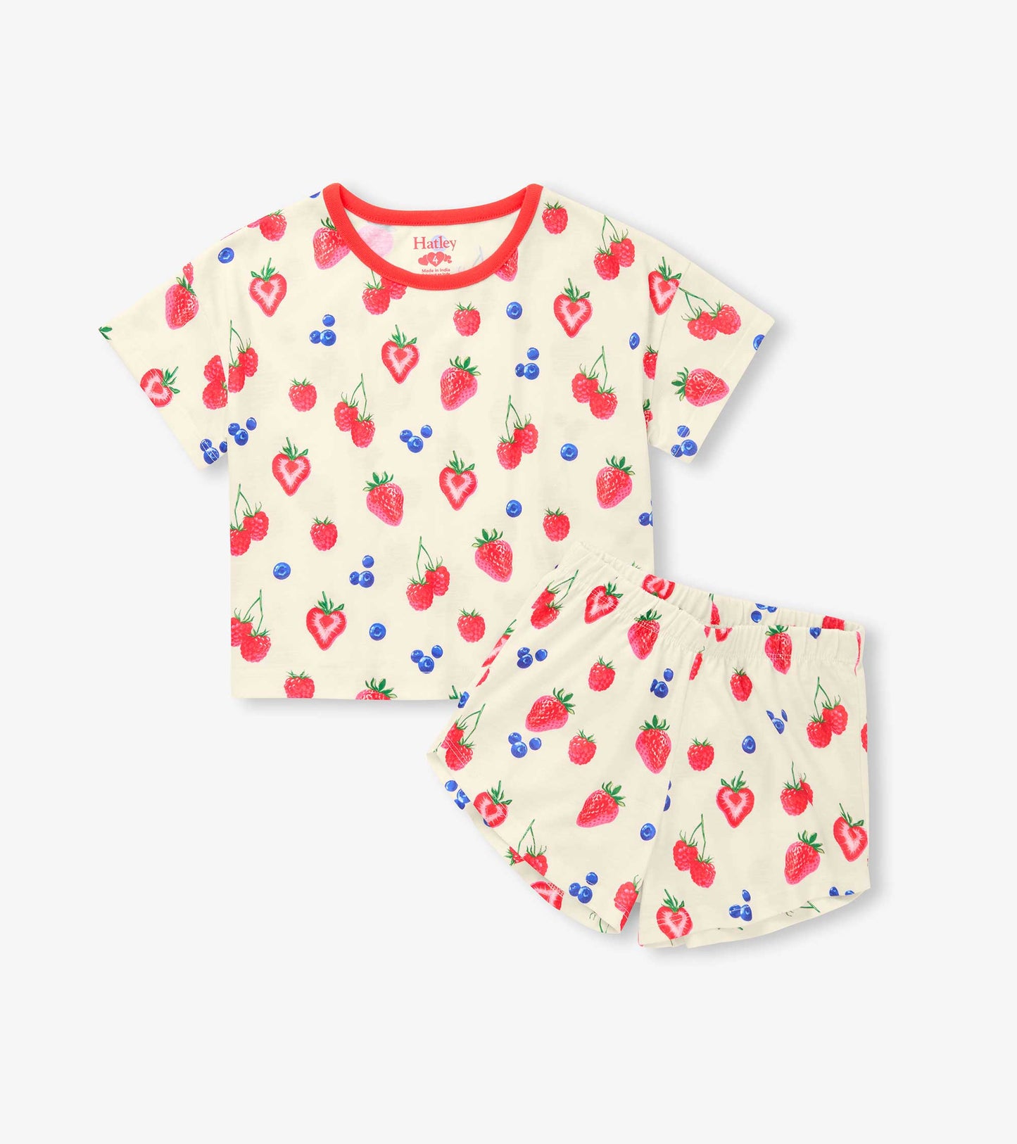 Cream short pajama set with red trim and allover strawberry, raspberry, and blueberry print