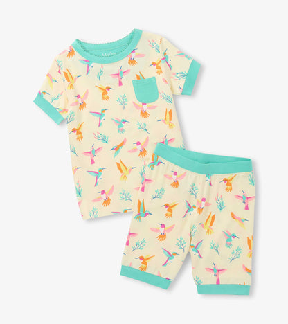 Girls cream short-sleeve pajama set with colorful hummingbird print and aqua trim, front view