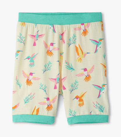 Girls cream bamboo pajama shorts with colorful hummingbird print and teal waistband and cuffs