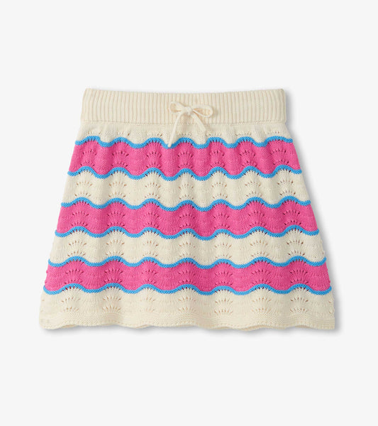 Girls cream crochet skirt with pink and blue wavy stripes and elastic waistband, front view