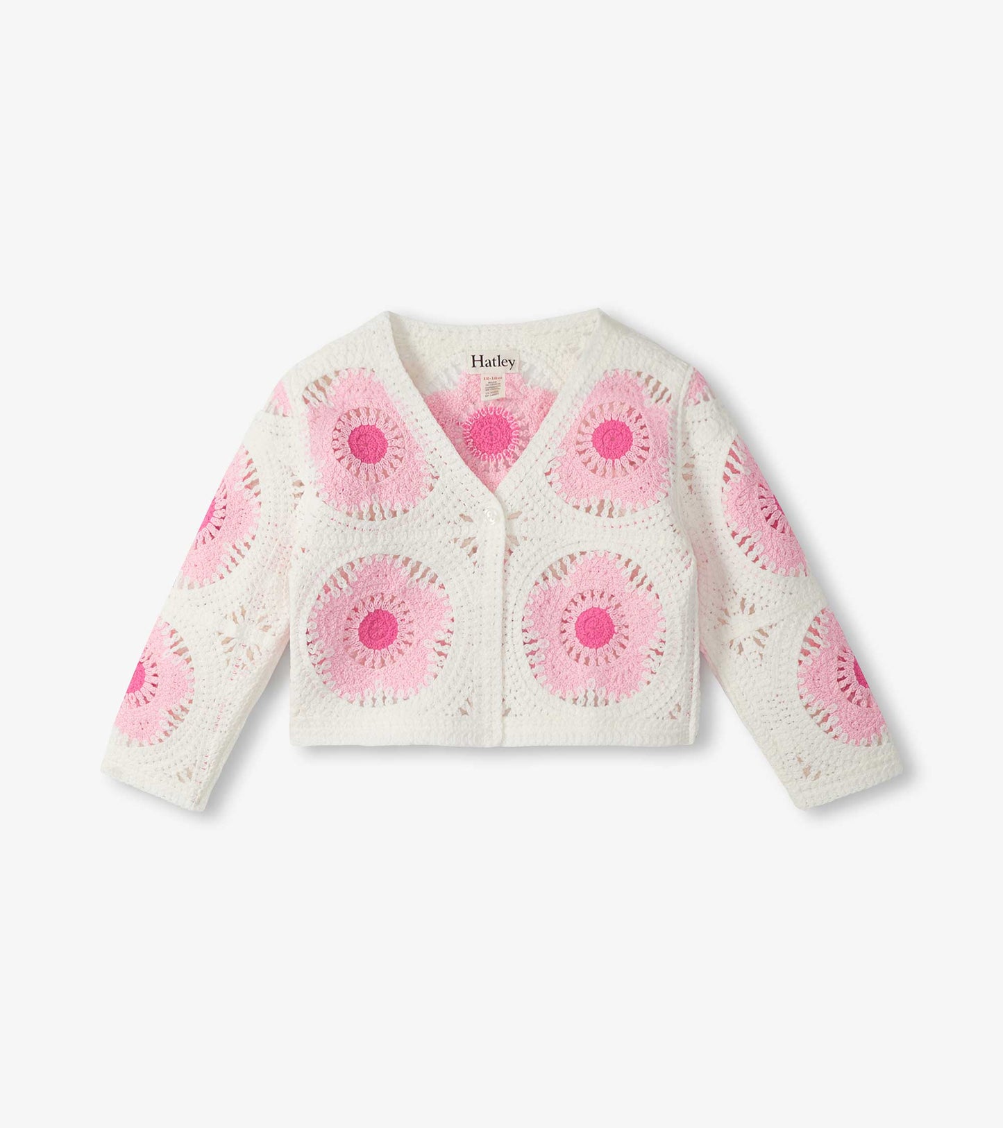 Cream crochet cardigan with pink circular flower pattern, long sleeves, and button front, front view