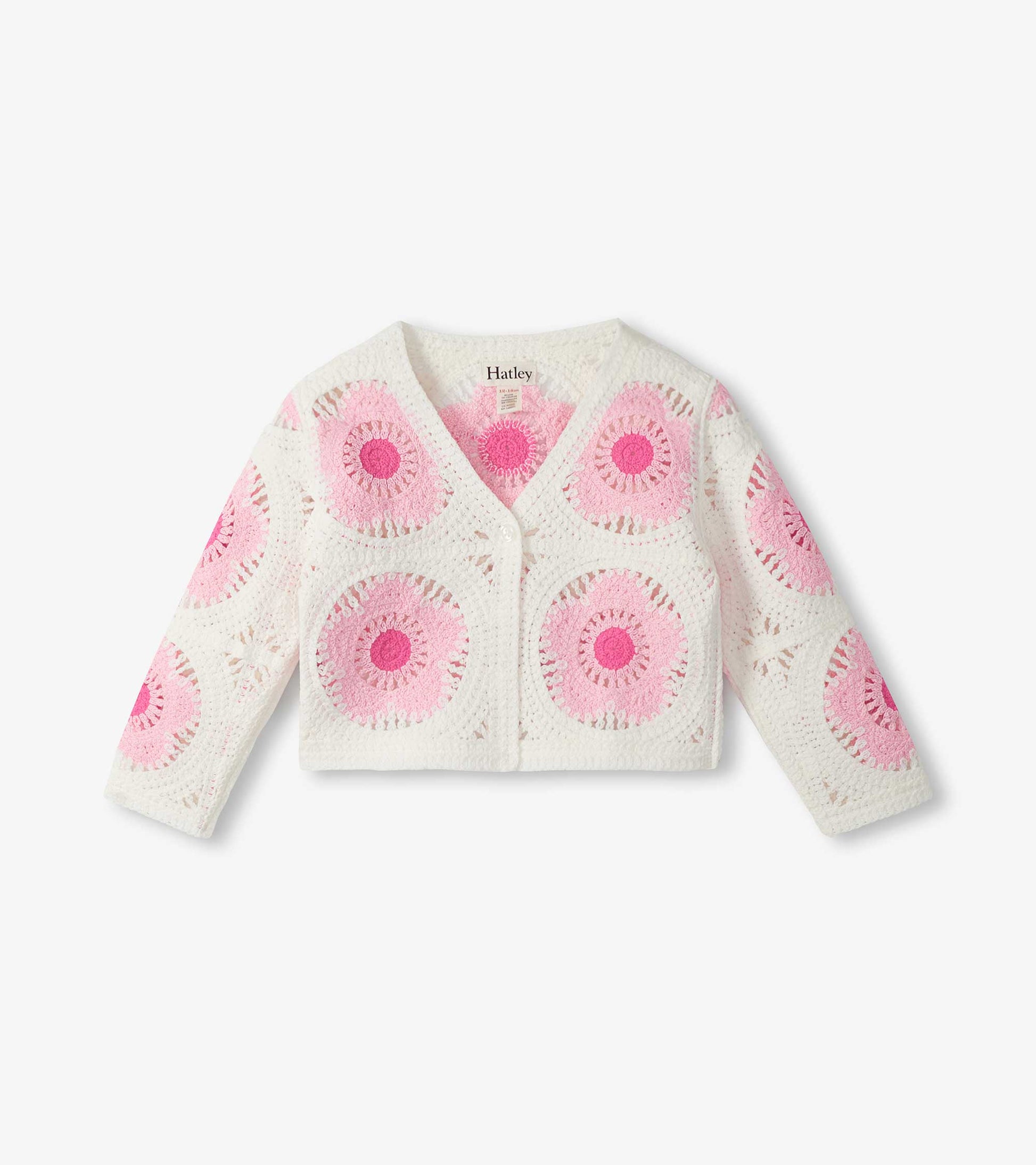 Cream crochet cardigan with pink circular flower pattern, long sleeves, and button front, front view