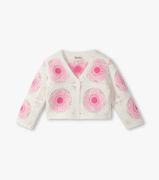 Cream crochet cardigan with pink circular flower pattern, long sleeves, and button front, front view