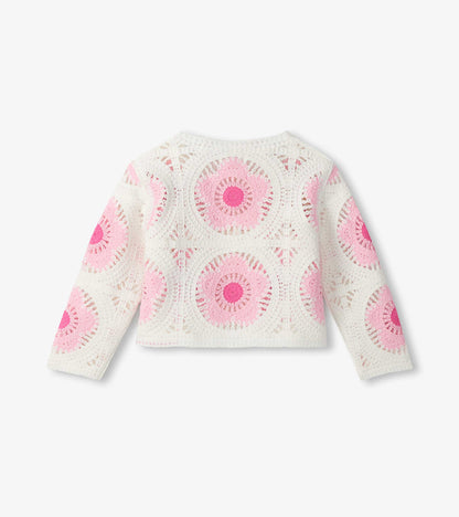 White crochet cardigan with pink circular floral pattern, long sleeves, front view