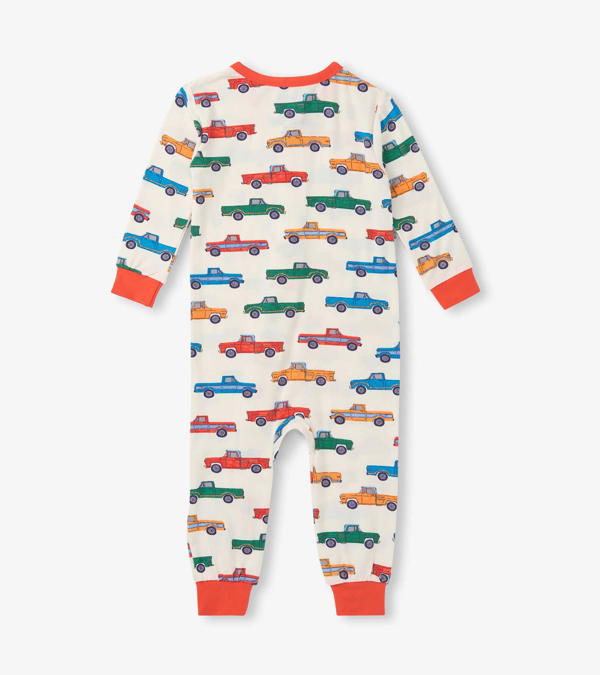 Cream baby sleeper with colorful truck print and orange trim, shown front view