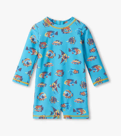 Blue long-sleeve baby rashguard swimsuit with colorful fish print and yellow trim, front view