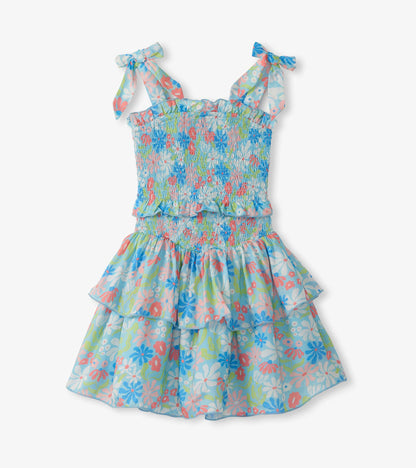 Girls blue floral smocked dress with tie shoulder straps and tiered ruffle skirt