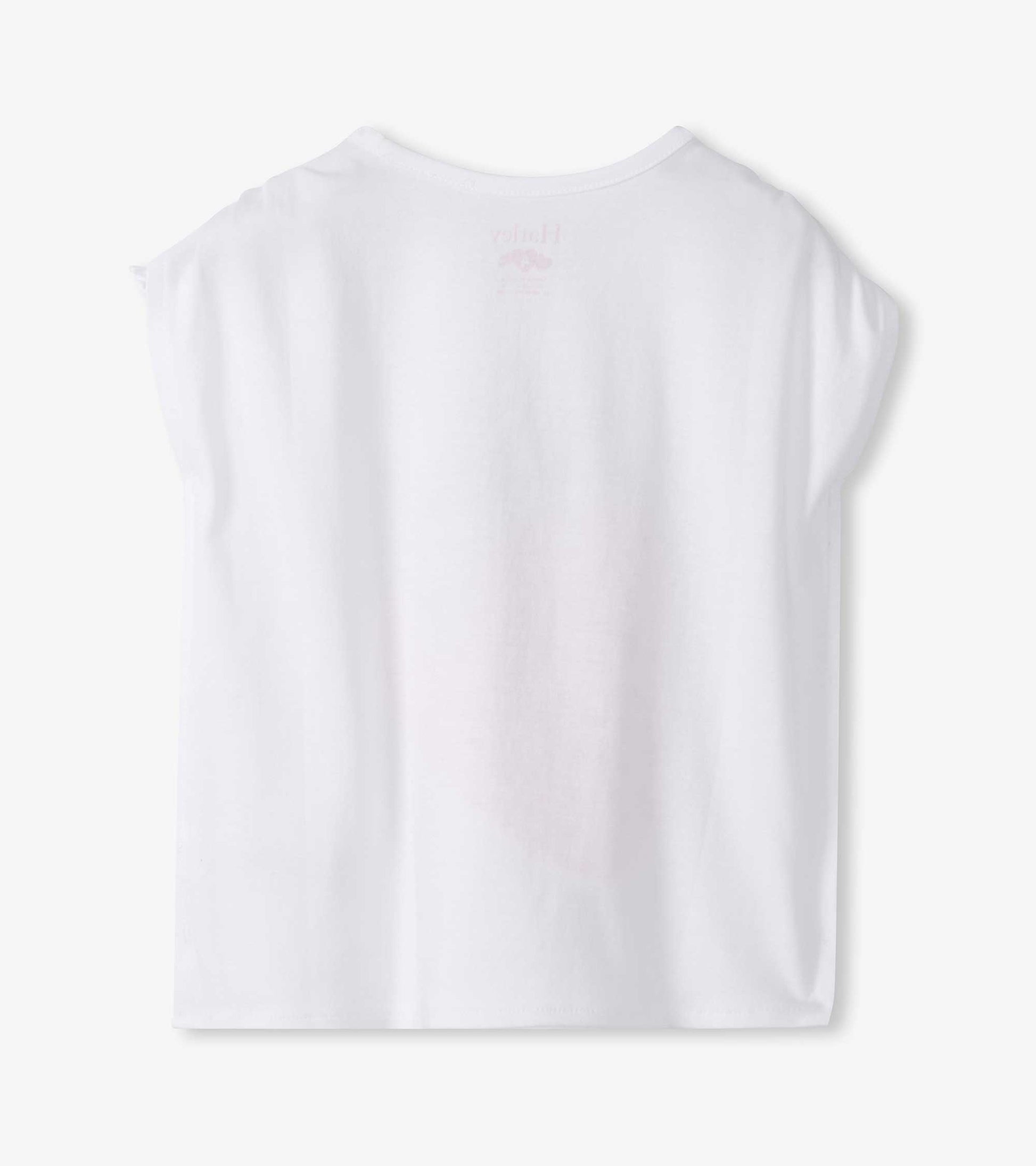 White short-sleeve girls top with cinched shoulders, back view, and faint strawberry print on the back neckline