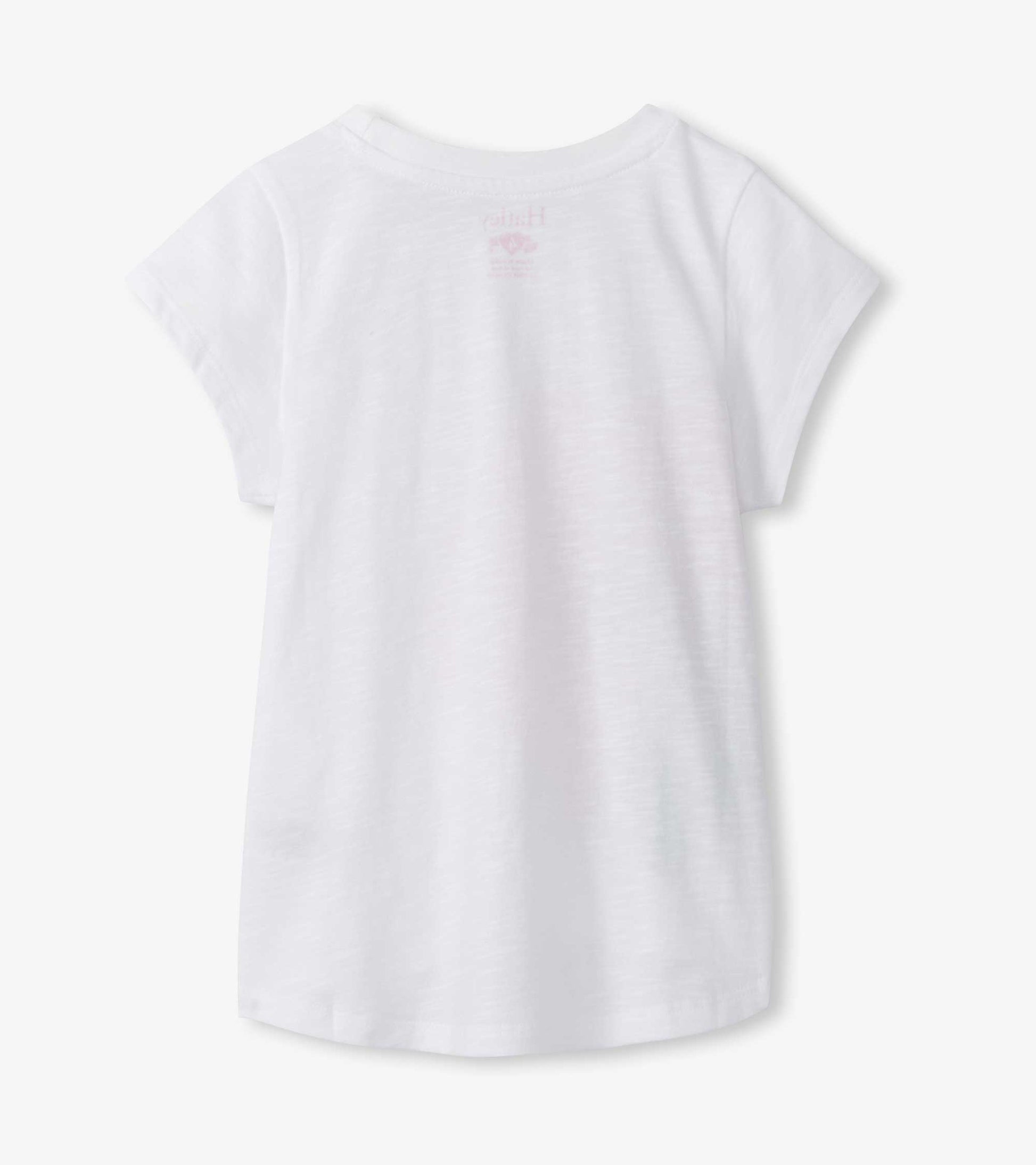 White short-sleeve girls T-shirt with crew neck and subtle pink hibiscus graphic on back, front view