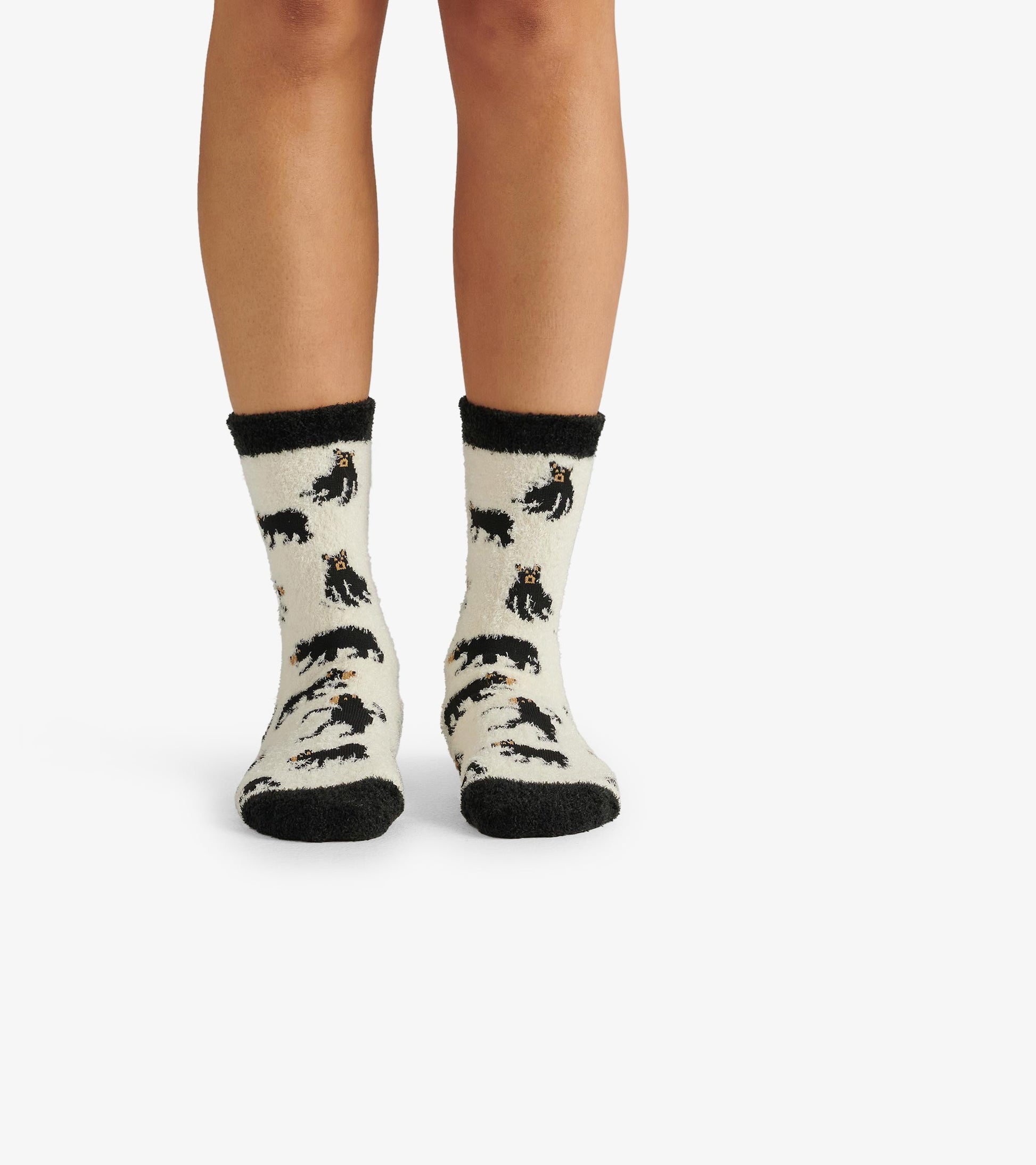 Cream socks featuring black bears, with a black cuff, designed for women's casual wear.