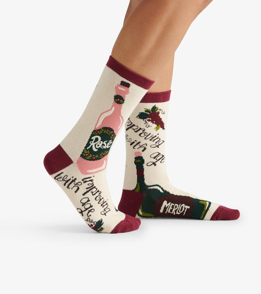 Cream crew socks featuring wine bottle designs and the phrase "Improving with Age," with burgundy accents.