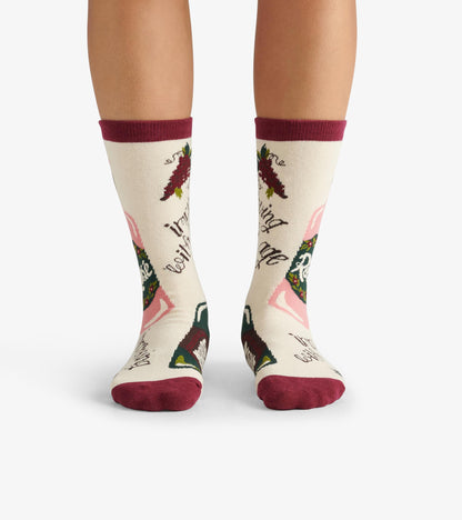 Cream crew socks with burgundy accents, featuring a floral pattern and the phrase "Improving with Age.