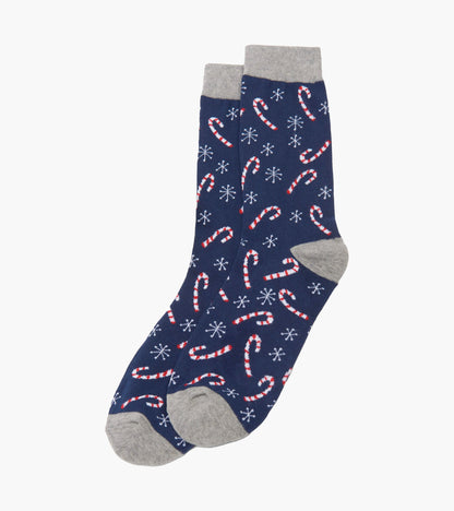 Navy crew socks featuring a candy cane and snowflake pattern with gray cuffs and toes. One size fits most.