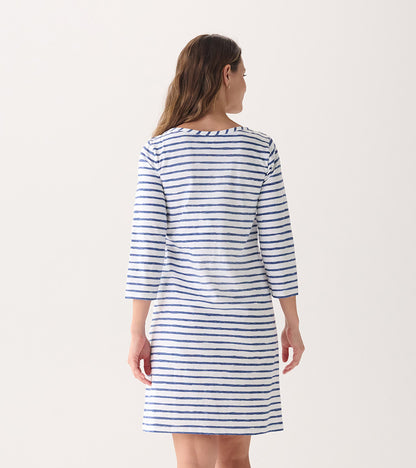 Back view of a women's summer dress featuring watercolor stripes in blue and white, with 3/4 sleeves and a relaxed fit.