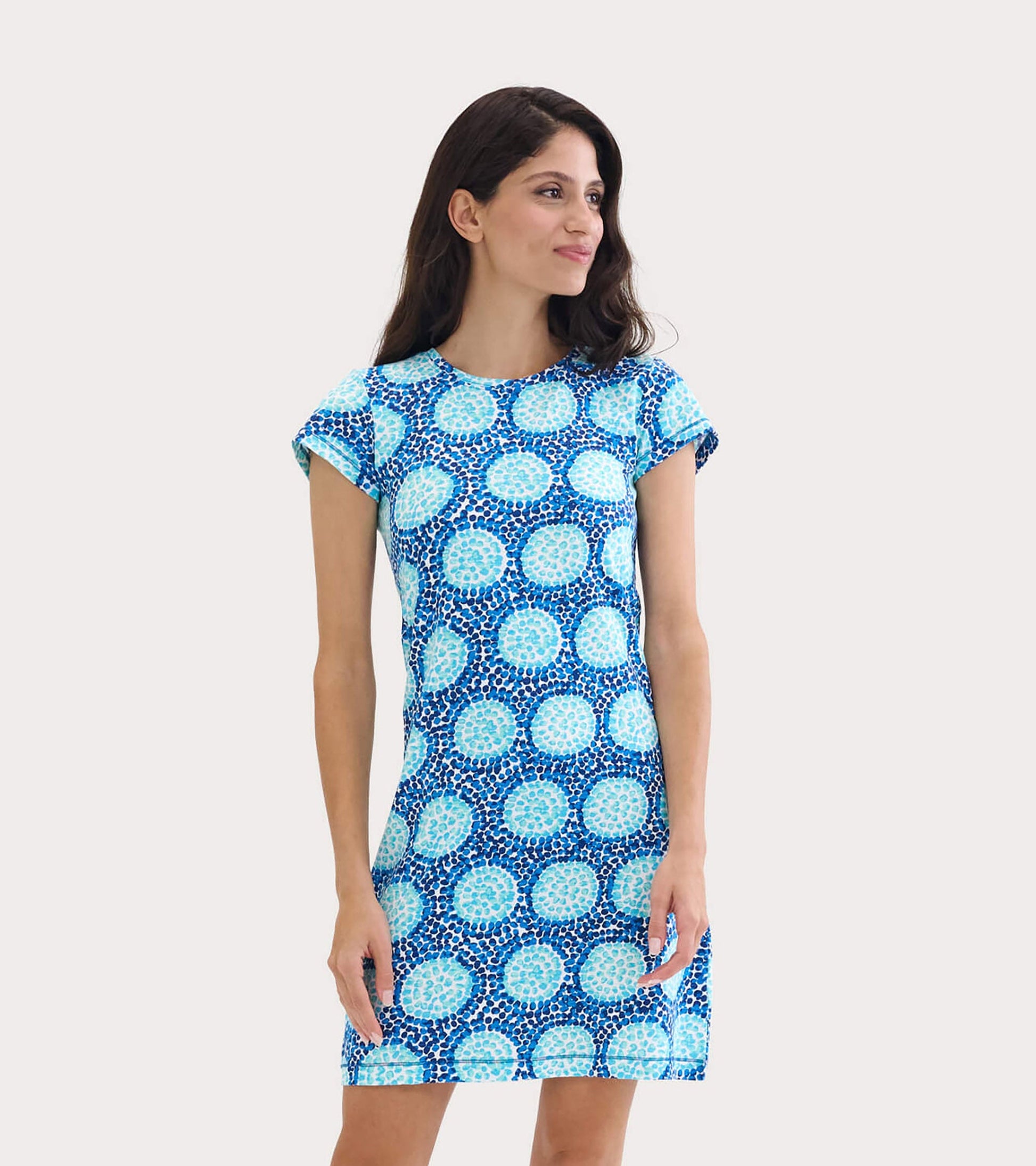 Short-sleeve crew neck t-shirt dress in blue with circular pattern, suitable for casual wear.