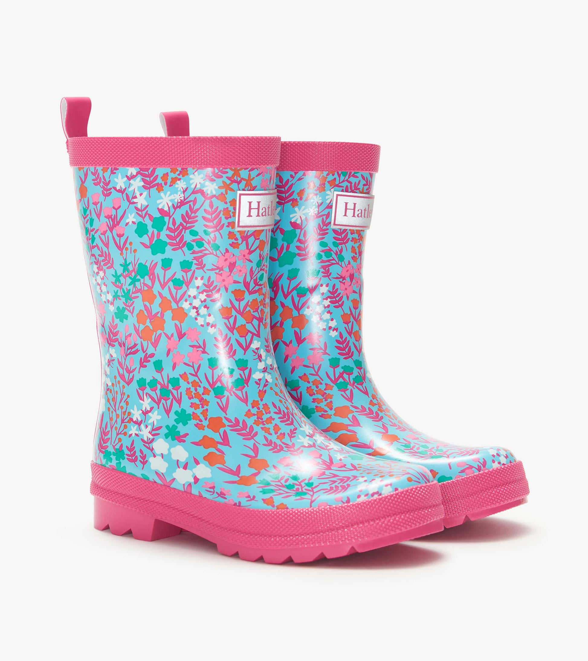 Girls blue floral rain boots with pink trim and soles, shown in a side view pair