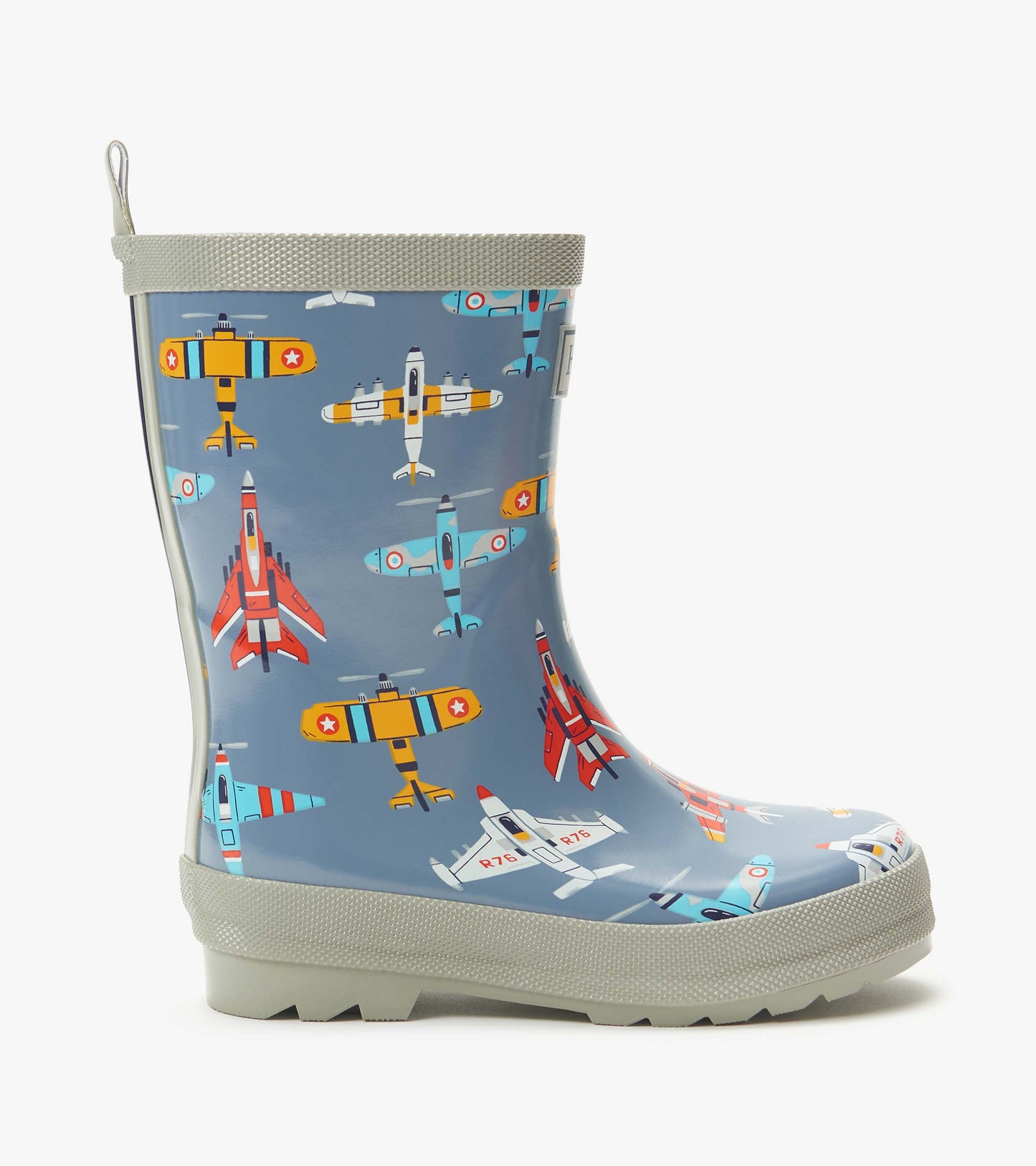 Blue kids rain boot with airplane print, gray trim, and pull tab, side view
