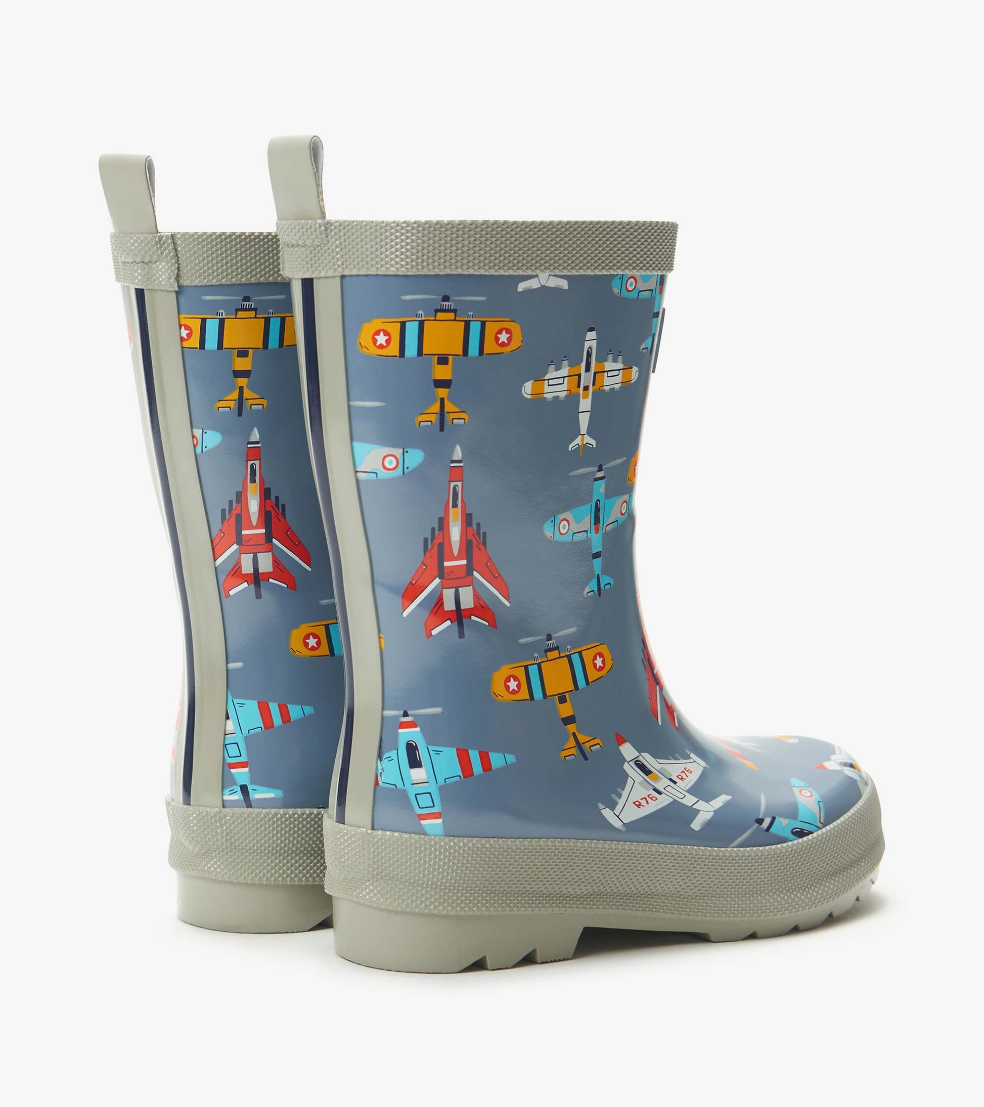 Blue kids rain boots with airplane print and gray trim, shown in side view