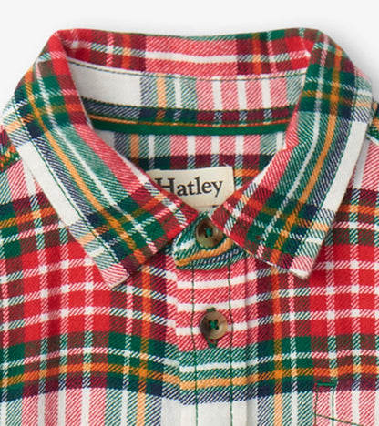Red, green, and white plaid button-down shirt with a collar and wooden buttons, suitable for festive occasions.