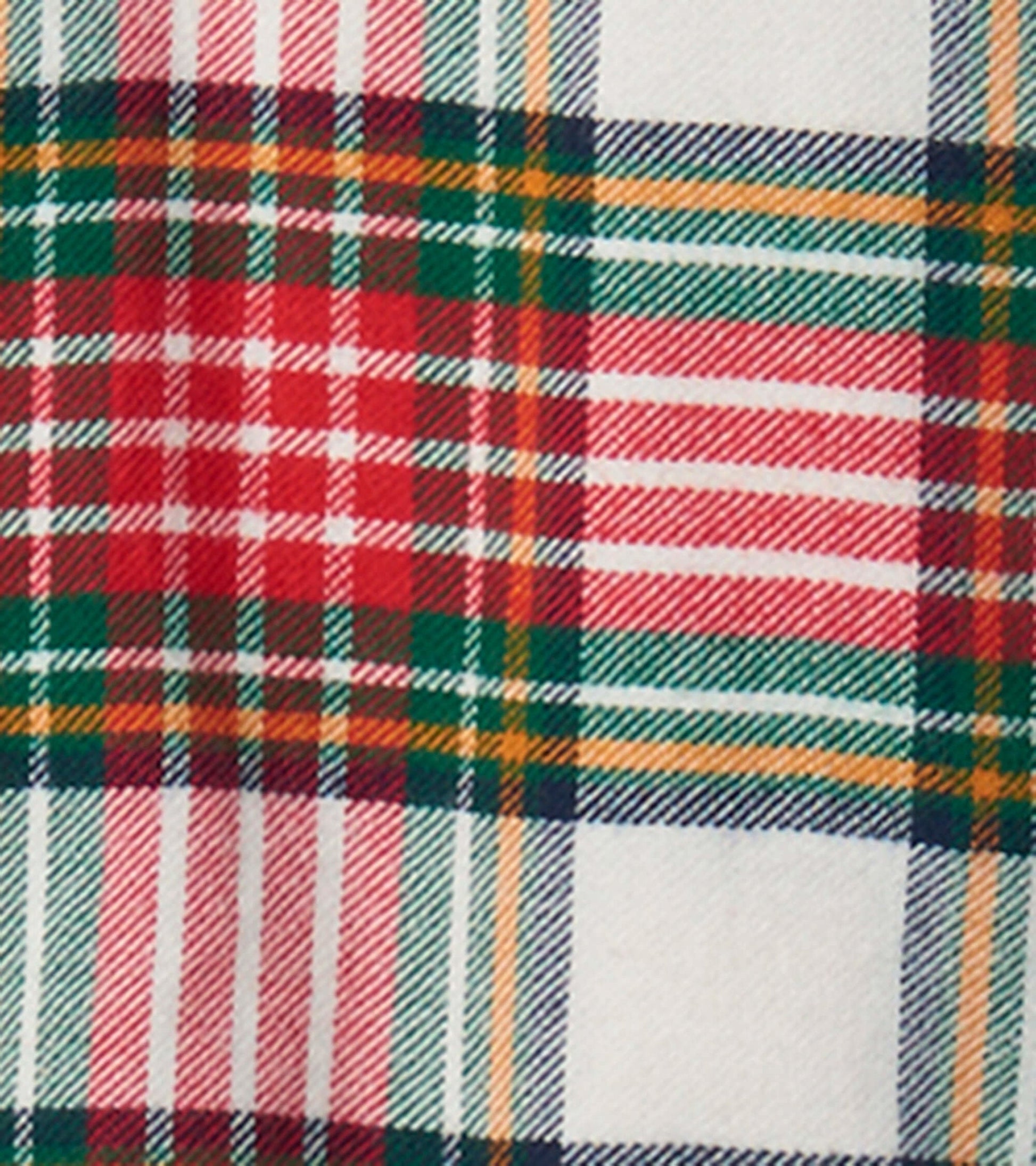 Red, green, and white plaid pattern on a button-down shirt, suitable for festive occasions.