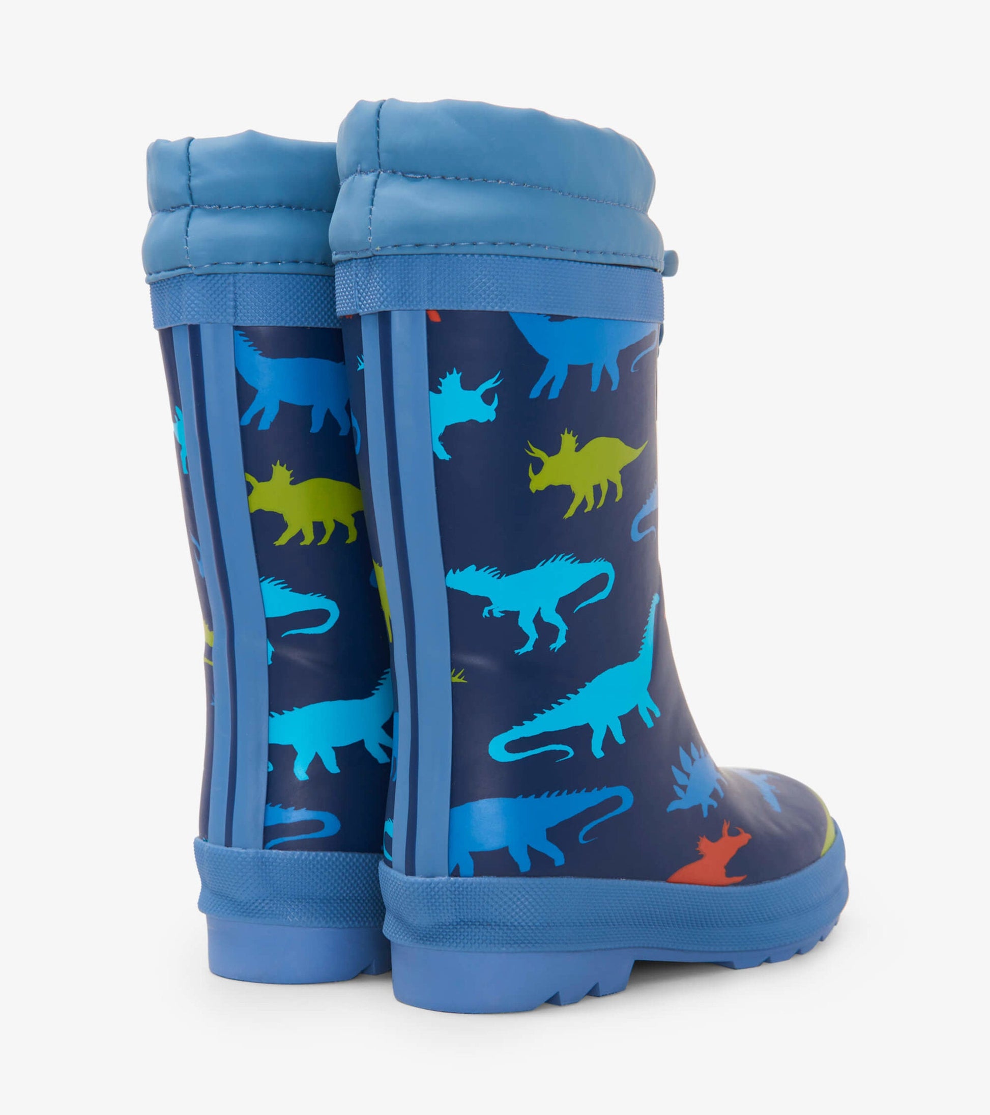 Blue kids' wellies featuring colorful dinosaur silhouettes on a navy background, with a Sherpa lining for warmth.