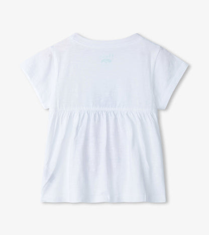 White short-sleeve tee with a gathered waist and a subtle pineapple graphic on the back.