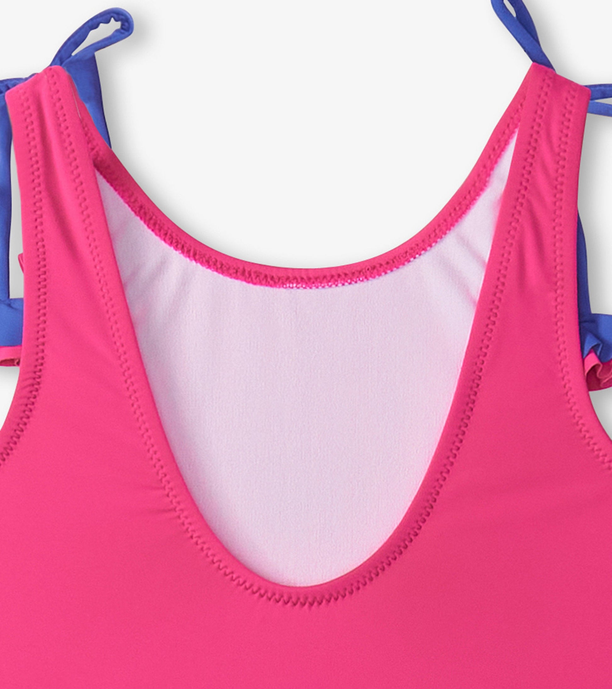 Pink swimsuit with shoulder bows, featuring a scoop neck and soft lining, suitable for girls.