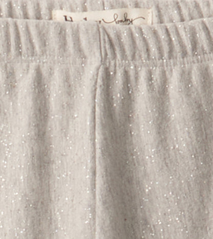 Grey melange leggings with a soft texture and subtle shimmer, featuring an elastic waistband for comfort.