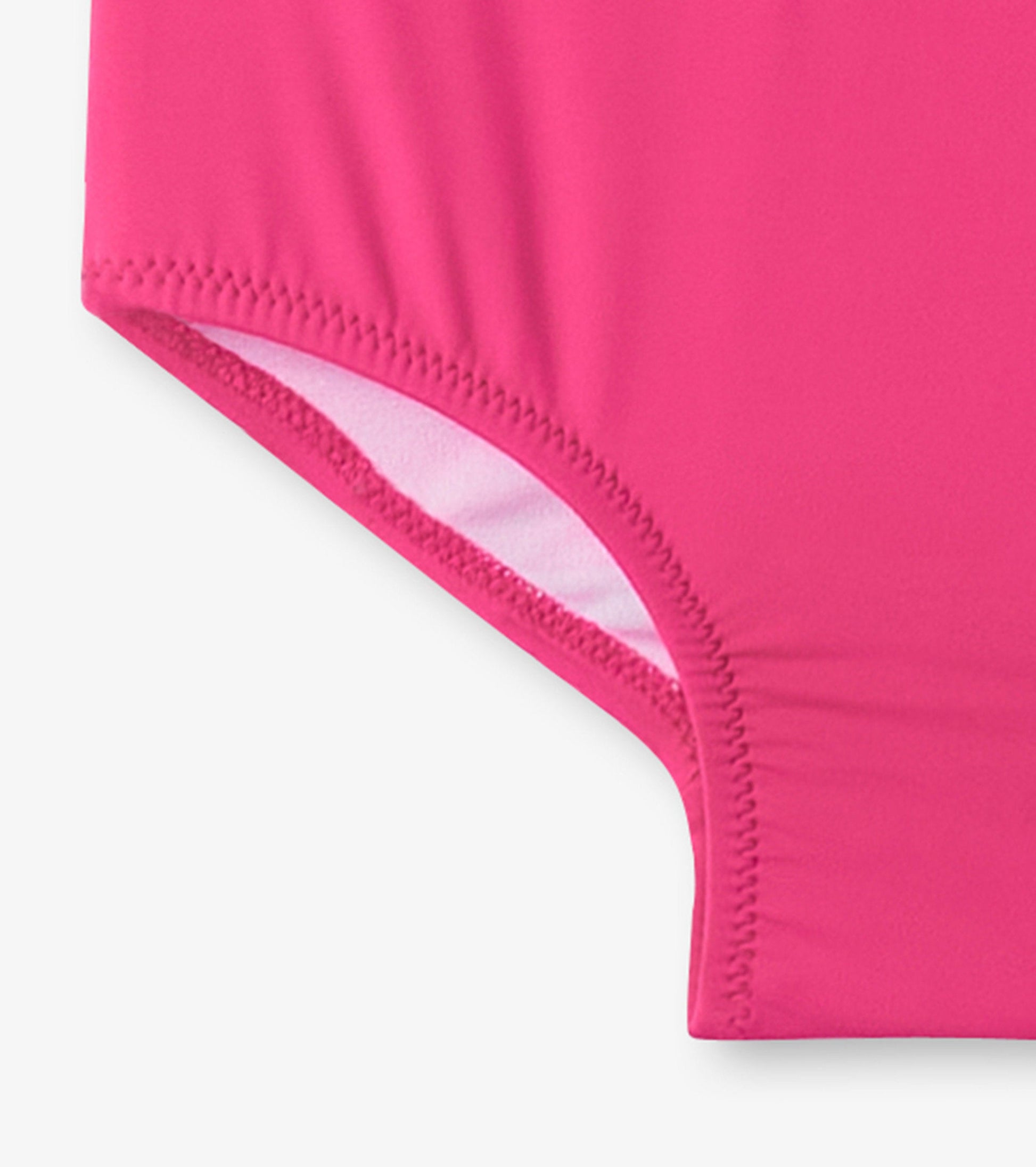Bright pink swimsuit with a smooth finish, featuring a shoulder bow detail, designed for girls.